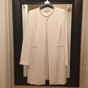 White jacket with pearl embellishment